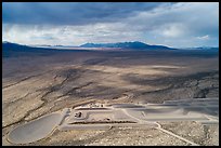 Aerial view of part of Michael Heizer's City with sun. Basin And Range National Monument, Nevada, USA ( color)