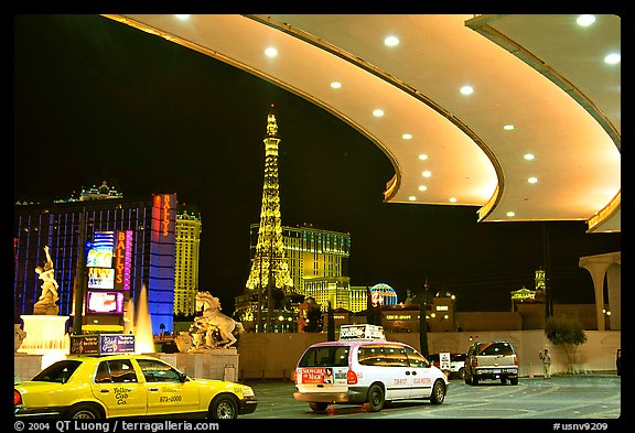 Taxis at hotel entrance, Paris Las Vegas. Las Vegas, Nevada, USA (color)