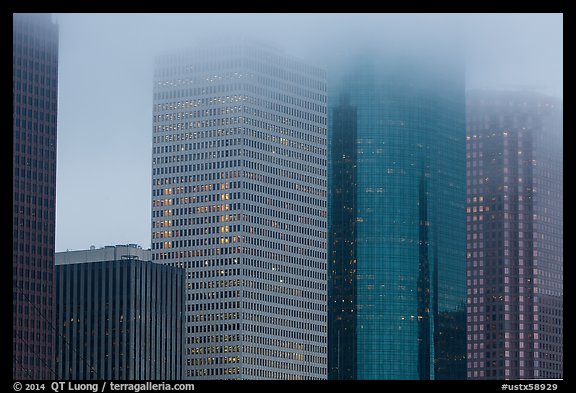 Skyscrapers in the fog at dawn. Houston, Texas, USA (color)