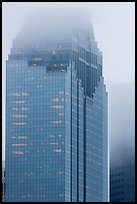 Top of skyscrapers capped in clouds. Houston, Texas, USA ( color)