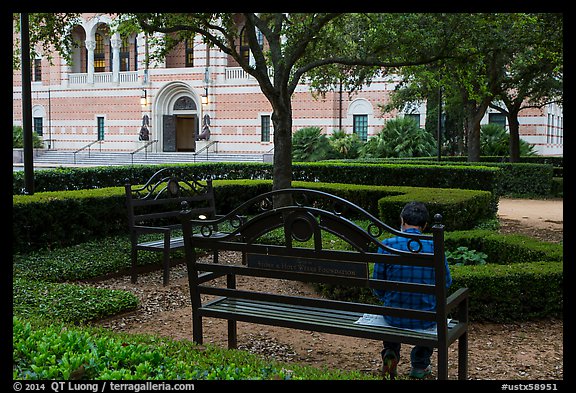 Man reading on bench, Rice University. Houston, Texas, USA (color)