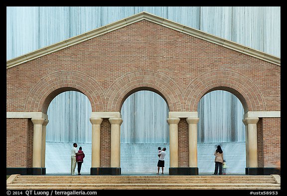 Gerald D. Hines Waterwall (Transco waterfall) and people. Houston, Texas, USA (color)