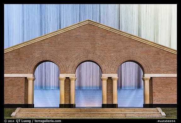 Gerald D. Hines Waterwall (Williams waterfall) at dusk. Houston, Texas, USA (color)