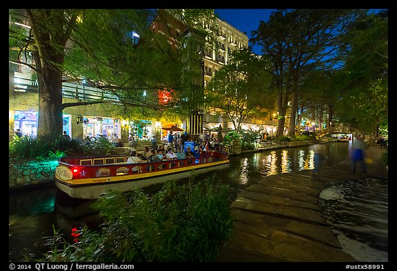 Barge and walkway at dusk, Riverwalk. San Antonio, Texas, USA (color)