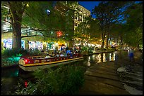 Barge and walkway at dusk, Riverwalk. San Antonio, Texas, USA ( color)