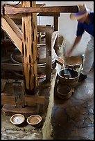 Man operating mill, Mission San Jose. San Antonio, Texas, USA