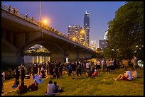 People gathered for dusk bat flight at Congress Bridge. Austin, Texas, USA ( color)