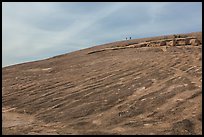 Granite dome with hikers, Enchanted Rock. Texas, USA ( color)