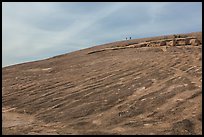 Granite dome with hikers, Enchanted Rock. Texas, USA ( color)