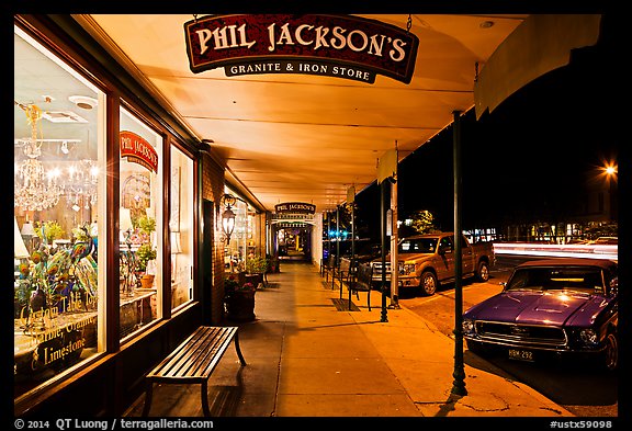 Sidewalk at night. Fredericksburg, Texas, USA (color)