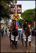 Women riding horses on sidewalk, Stockyards. Fort Worth, Texas, USA ( color)