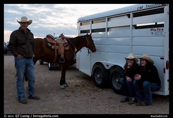 Group talking next to horse and trailer. Fort Worth, Texas, USA (color)