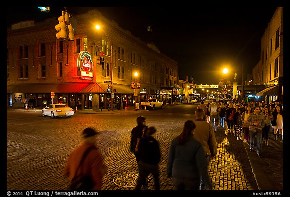 Street crossing at night, Fort Worth Stockyards. Fort Worth, Texas, USA (color)