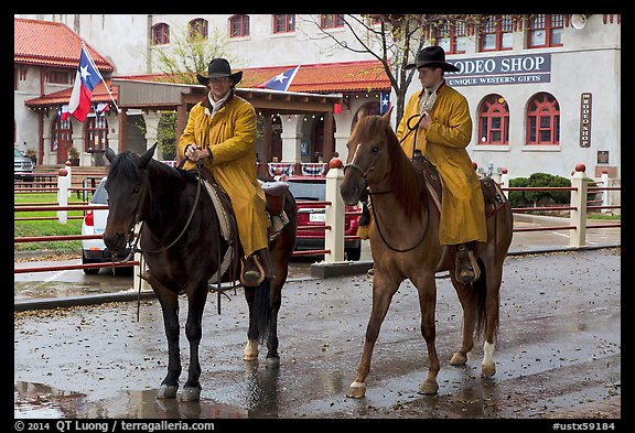 Cowboys in raincoats. Fort Worth, Texas, USA (color)