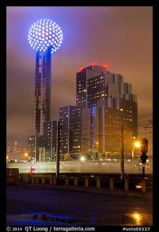 Reunion Tower and passing train at night. Dallas, Texas, USA (color)