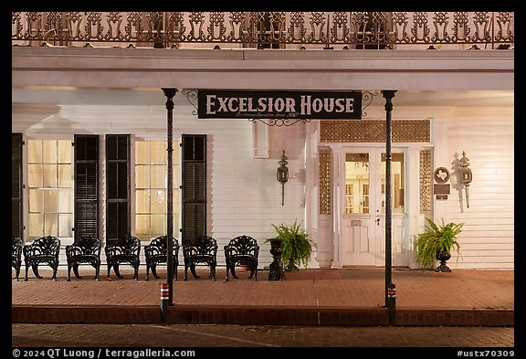 Excelsior House porch at night. Jefferson, Texas, USA (color)