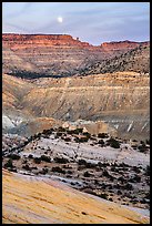 Moon rising over colorful rocks of the Cockscomb. Grand Staircase Escalante National Monument, Utah, USA ( color)