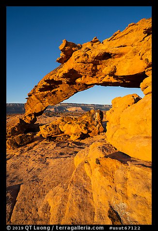 Graceful span of Sunset Arch, early morning. Grand Staircase Escalante National Monument, Utah, USA