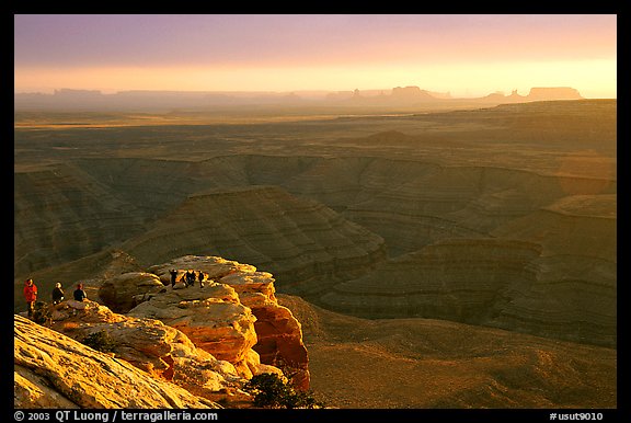 Watching the sunset over the San Juan River, Monument Valley in the background. Utah, USA