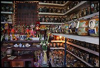 Temple room containing funeral urns with ashes of the deceased. Ho Chi Minh City, Vietnam (color)