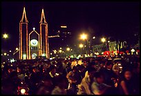 Crowds gather in front of the Cathedral St Joseph for Christmans. Ho Chi Minh City, Vietnam ( color)