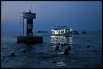 Lighted boat a dusk. Phu Quoc Island, Vietnam