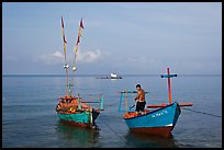 Fisherman on skiff. Phu Quoc Island, Vietnam ( color)