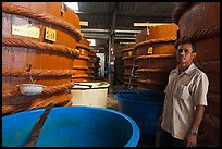 Worker in fish sauch factory, Duong Dong. Phu Quoc Island, Vietnam (color)