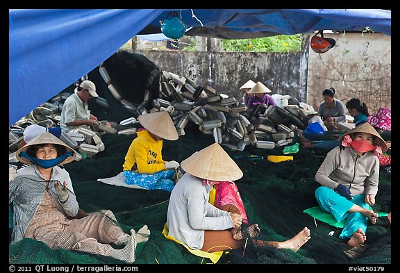 Women mending fishing nets, Duong Dong. Phu Quoc Island, Vietnam (color)