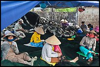 Women mending fishing nets, Duong Dong. Phu Quoc Island, Vietnam (color)