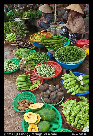 Women selling fruit and vegetables at market, Duong Dong. Phu Quoc Island, Vietnam (color)