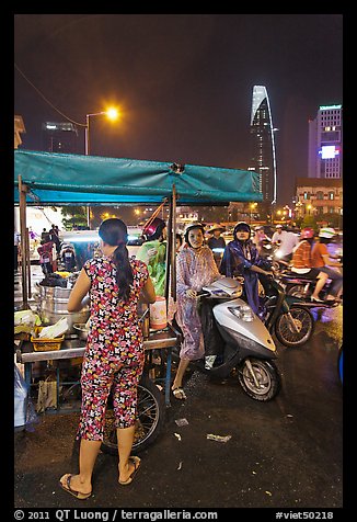 Street food stand at night. Ho Chi Minh City, Vietnam (color)