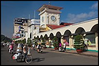 Food vendor riding outside Ben Thanh Market. Ho Chi Minh City, Vietnam