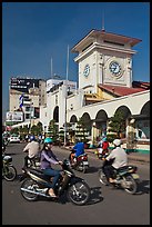 Chaotic motorcycle traffic outside Ben Thanh Market. Ho Chi Minh City, Vietnam