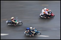 Motorbike riders seen from above with speed blur. Ho Chi Minh City, Vietnam