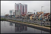 Expressway and high rise on the banks of the Saigon Arroyau. Cholon, Ho Chi Minh City, Vietnam ( color)