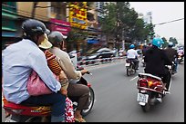 Motorcycle traffic seen from a motorcyle in motion. Ho Chi Minh City, Vietnam