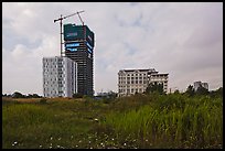 High rise towers in construction on former swampland, Phu My Hung, district 7. Ho Chi Minh City, Vietnam (color)