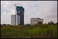 High rise towers in construction on former swampland, Phu My Hung, district 7. Ho Chi Minh City, Vietnam