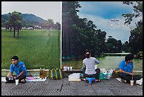 Male students, female food vendor, and landscapes. Ho Chi Minh City, Vietnam ( color)