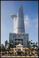 Bitexco Tower (tallest in the city) dwarfing colonial-area building. Ho Chi Minh City, Vietnam