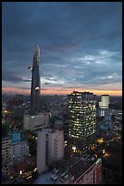 Bitexco Tower and city lights at sunset. Ho Chi Minh City, Vietnam (color)