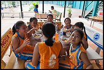 Girls athetics team eating, Cong Vien Van Hoa Park. Ho Chi Minh City, Vietnam ( color)
