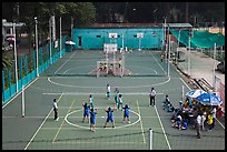 Girls Volleyball players and coaches, Cong Vien Van Hoa Park. Ho Chi Minh City, Vietnam (color)