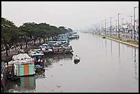 Cargo boats moored on Saigon Arroyau. Cholon, Ho Chi Minh City, Vietnam ( color)