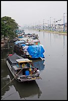 Mariners aboard barges, Saigon Arroyau. Cholon, Ho Chi Minh City, Vietnam ( color)
