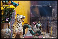 Ceramic tiger, dragon, and oven, Quan Am Pagoda. Cholon, District 5, Ho Chi Minh City, Vietnam (color)