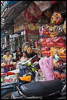 Store selling traditional dragon masks. Cholon, Ho Chi Minh City, Vietnam