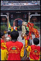 Drumners and dragon dancers in front of Thien Hau Pagoda, district 5. Cholon, District 5, Ho Chi Minh City, Vietnam (color)