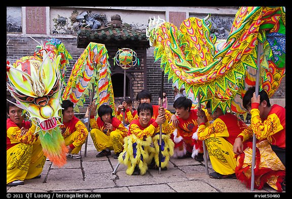 Dragon dancers at rest, Thien Hau Pagoda. Cholon, District 5, Ho Chi Minh City, Vietnam (color)